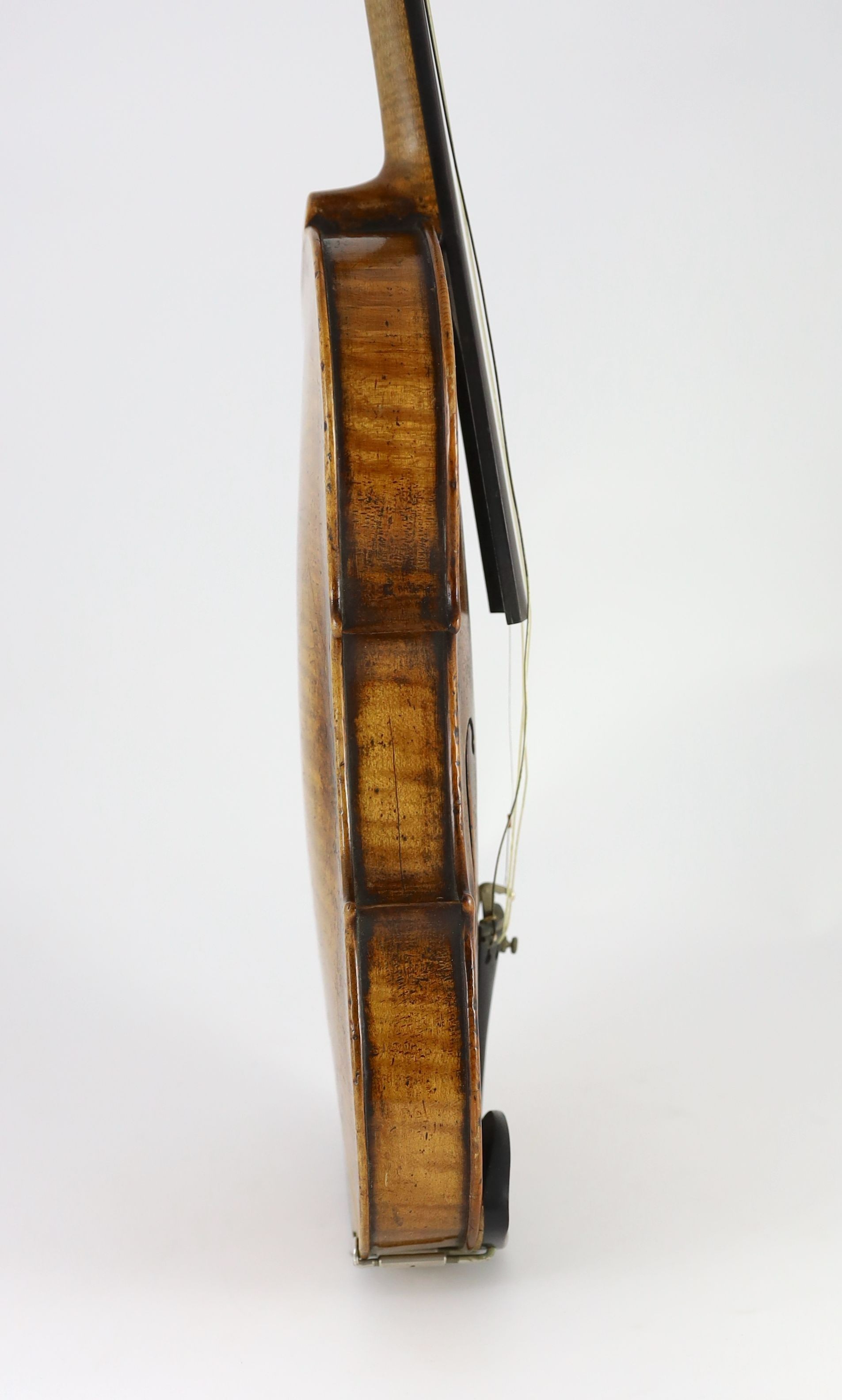A 19th century violin, degraded internal paper label reads ‘Amati’, back measurement 36cm
